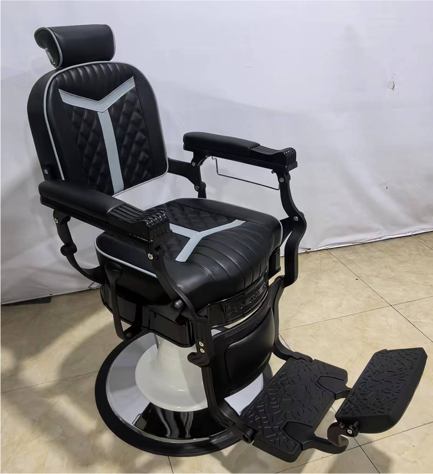 Modernly designed barber chair in black with stylish accents