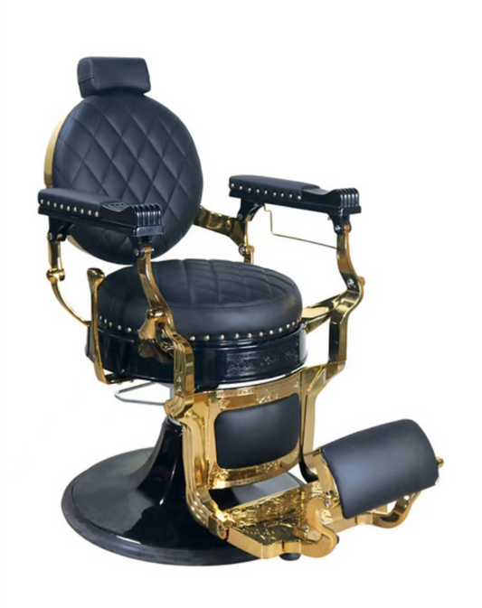 Luxurious barber chair in black with gold-plated accents
