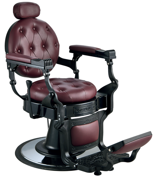 Luxurious barber chair in burgundy red with black frame
