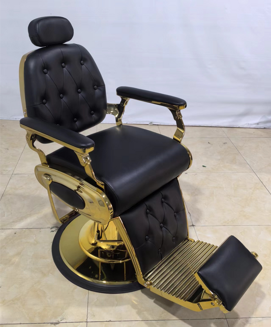 Luxurious barber chair in black with gold accents