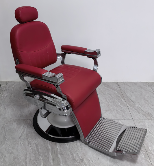 Elegant barber chair in Bordeaux red with chrome finish