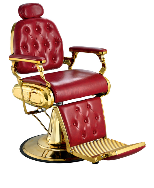 Luxurious barber chair in red with gold-plated accents