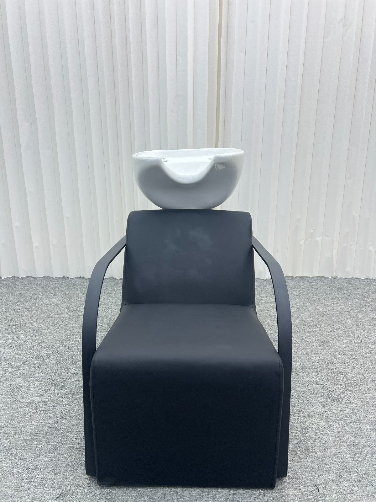 Modern washing unit with ergonomic design and white sink