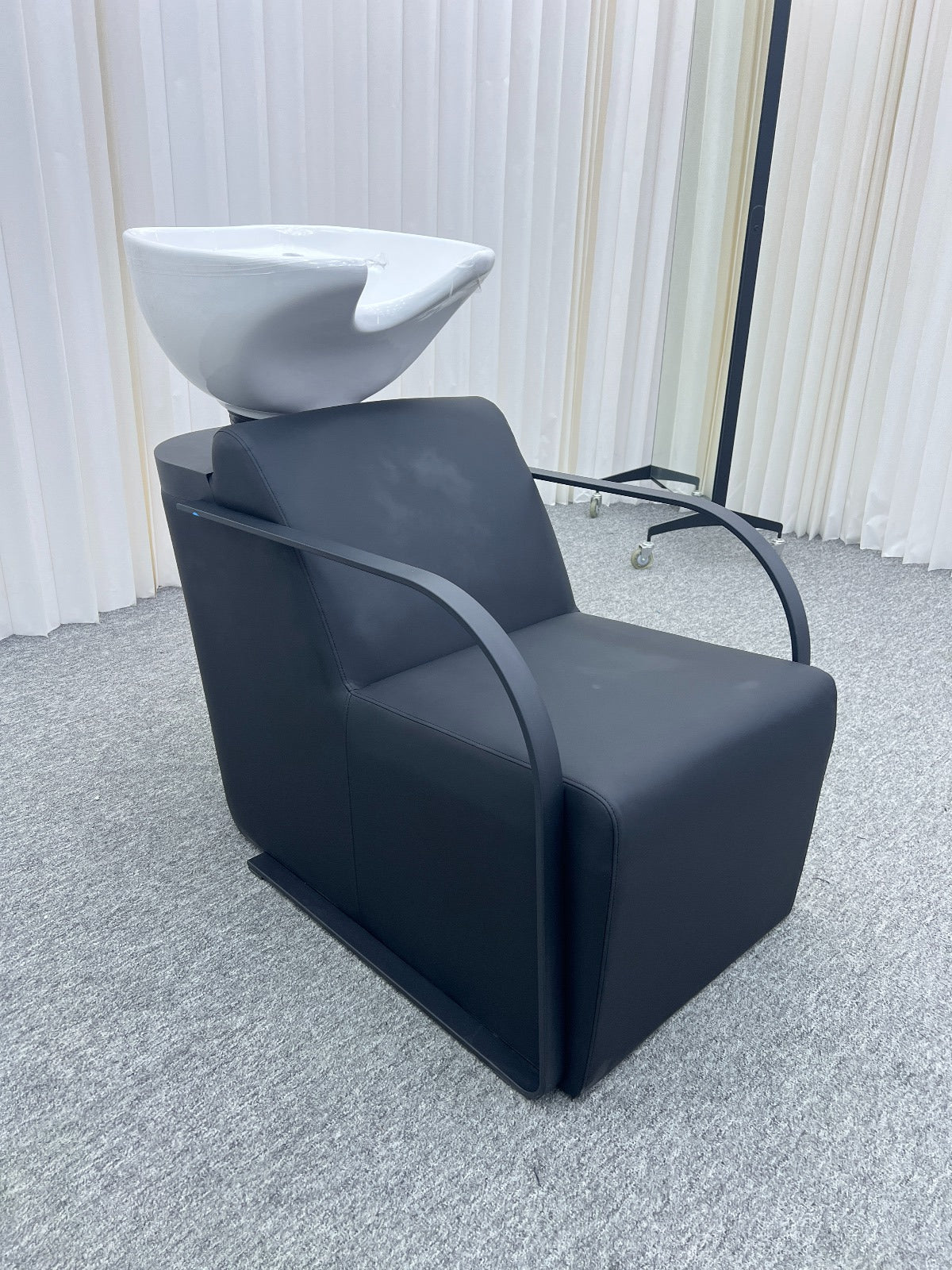 Modern washing unit with ergonomic design and white sink