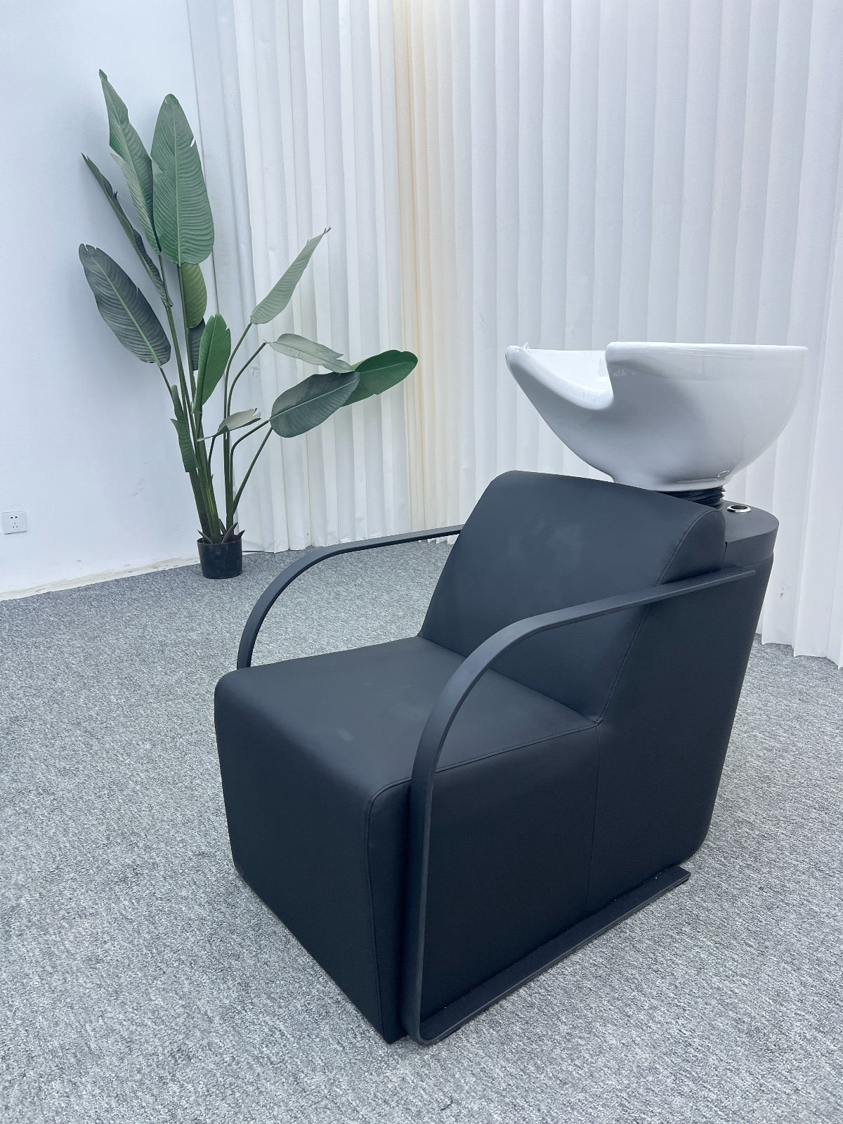 Modern washing unit with ergonomic design and white sink